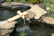 The base is laid with anti-seepage membrane (PVC/ rubber) and the edge is pressed with pebbles to prevent slipping.
