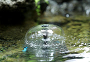 The filtered clear water is returned to the pool through nozzles/small waterfalls.